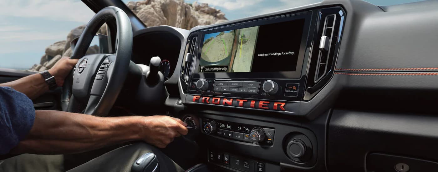 Steering wheel and dashboard in a 2026 Nissan Frontier
