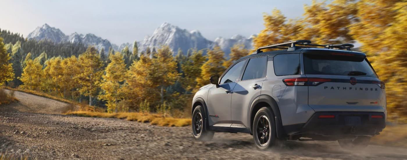 A gray 2026 Nissan Pathfinder driving offroad.